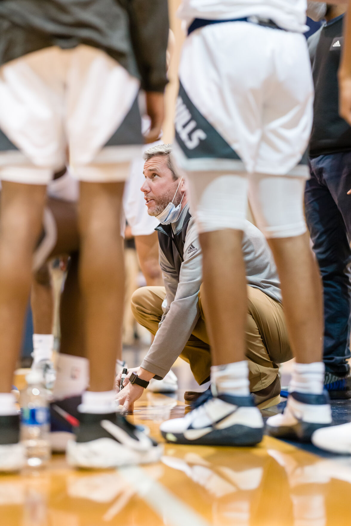Boys Basketball: Hickory Ridge RaginÕ Bulls defeated the Northwest Cabarrus Trojans 64-56.